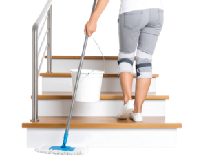 Woman Cleaning Stairs with Mop and Bucket