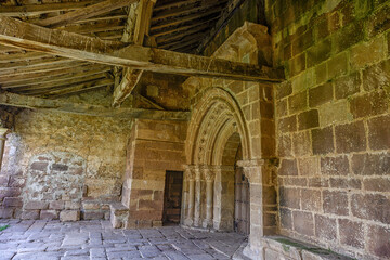 Ornate stone door of the Church of Our Lady of the Assumption in Rueda del Pisuerga