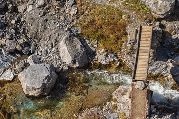 autumnal mountain landscape inside the Stelvio National Park along the Lombard side, Sondrio, Italy