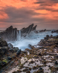 The waves at Karang Sawarna Beach in West Java are a force to be reckoned with, crashing against the rugged coastline with immense power and fury