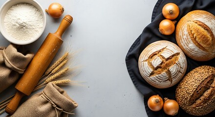 Artisan bread baking ingredients and freshly baked loaves overhead view