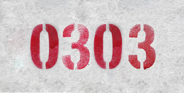 Red Number 0303 on the white wall. Spray paint.