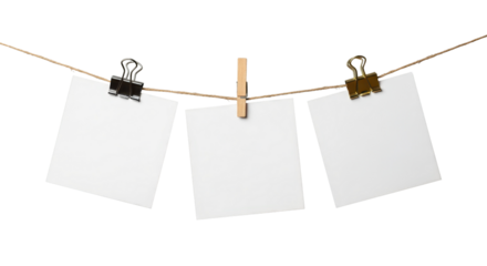 Three blank paper notes hanging on a string with clothespins isolated PNG with Transparent Background