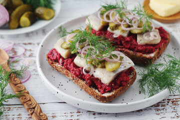 Scandinavian sandwiches with herring and beetroot	