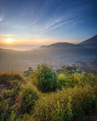 The mountains at dawn are stunning, with misty air and golden light
