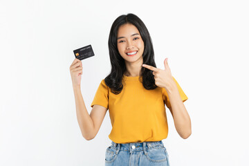 Smiling asian woman hand holding credit card on white background.