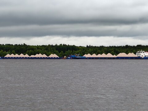 Barges Transporting Freight on a River