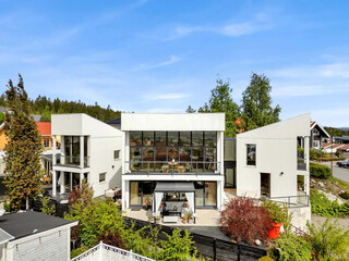 Modern luxury villa exterior in minimal scandinavian style, 3d render