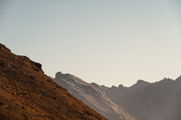 Fototapeta premium sunset over an autumnal mountain landscape inside the Stelvio National Park along the Lombard side, Sondrio, Italy