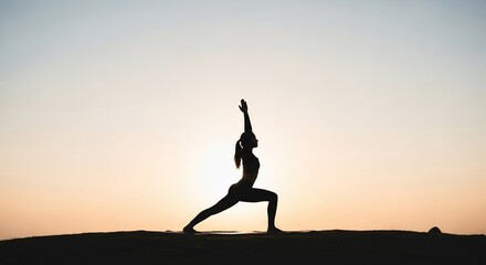 Silhouette of a Woman Practicing Yoga at Sunrise for Fitness and Well-being