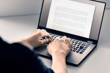 Writer writing content or blog with computer. Article or letter with laptop. Typing text. Book, journal or news report. College essay or cv work application. Journalist or editor. Digital document.