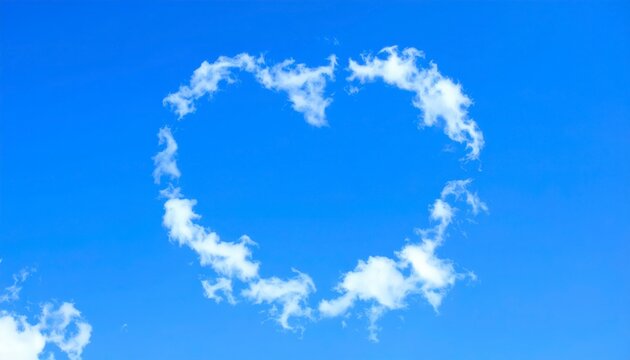 Dreamy heart shaped cloud floats serenely in the bright blue sky symbolizing love and hope today