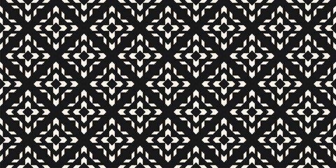 Vector seamless pattern with ethnic motif. Modern geometric floral folk ornament. Simple abstract black and white background texture with grid, flower shapes. Repeated design for textile, plaid, cover