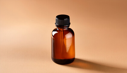 an amber glass bottle with a black lid sits on a light brown surface