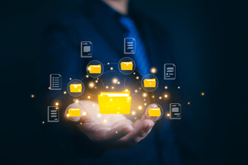 Show document management system on hand. Managing corporate file information, document work management with technology software for archiving, document, technology, quality, file