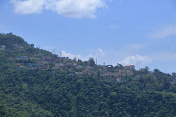 Fototapeta premium Narendra Nagar, located in Tehri Garhwal district of Uttarakhand, is a peaceful hill town known for its scenic beauty, royal history, and panoramic views of the Himalayas and the Ganga valley. 