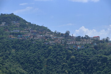Fototapeta premium Narendra Nagar, located in Tehri Garhwal district of Uttarakhand, is a peaceful hill town known for its scenic beauty, royal history, and panoramic views of the Himalayas and the Ganga valley. 