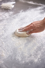pizza dough on the table, close-up