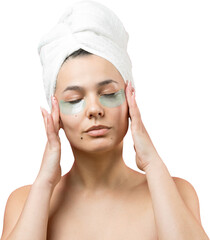 Young beautiful girl in a white towel on his head wears collagen gel patches under her eyes. Mask...