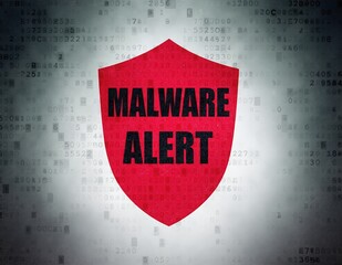 A close-up view of a computer screen displaying a bright red malware alert notification, warning users of potential threats and urging immediate action.
