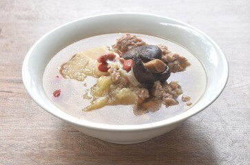 boiled cabbage stuffed mashed pork with glass noodles topping mushroom n soup on bowl