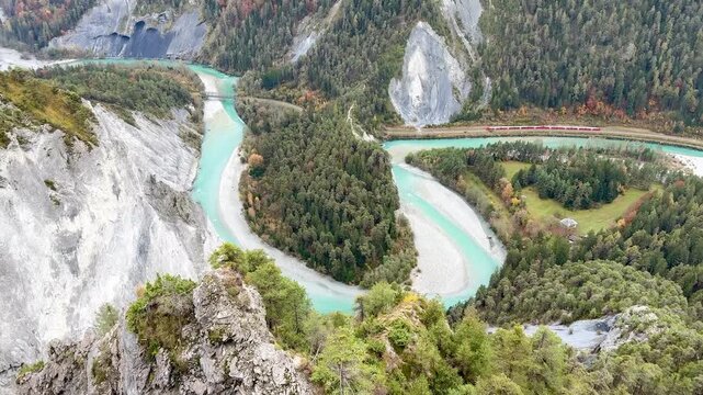 Magnificent view of the Rhine Gorge, also known as the Ruinaulta or &ldquo;Swiss Grand Canyon&rdquo;, from the &ldquo;Il Spir&rdquo; point near Flims. The Rhaetian Railway line from Chur to Illanz runs through the gorge.