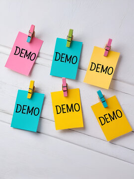 Word writing text Demo. Business photo showcasing exemplification display expression show visual communication reflection Colored clothespin papers empty reminder white floor background office