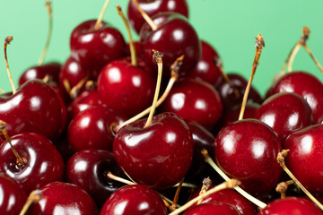 Fresh Sweet Cherries with Vibrant Green Backdrop.