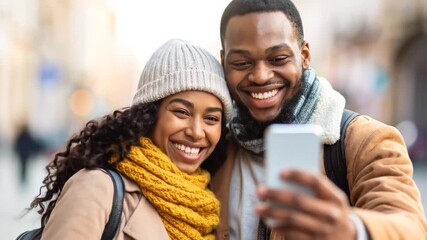 Happy couple taking selfie outdoors