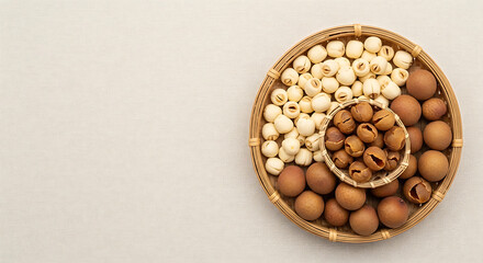 Mixed Nuts and Legumes in Wooden Bowl on Beige Background