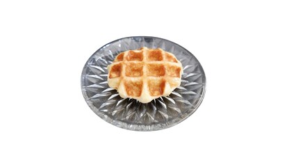 Delicious Golden Waffle on Elegant Clear Glass Plate Isolated