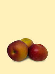 Three fresh apples on a bright yellow background. Fruit event banner. National Apple Day to celebrate on October 21st.