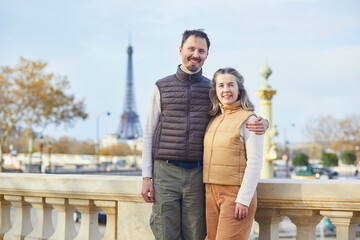 Happy romantic couple spending time together on a fall day in Paris, France