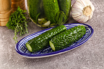 Homemade lighty salted cucumbers with herbs