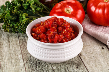 Diced ripe tomato with sauce