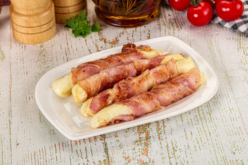 Hot mozzarella sticks with bacon