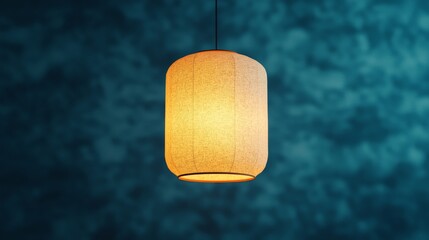 A single warm, glowing hanging paper lantern against a dark, textured blue background.