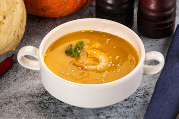 Pumpkin cream soup with prawns