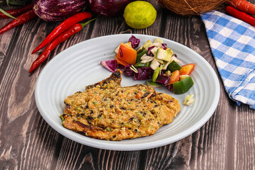Tasty chicken steak with vegetables