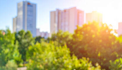 Blurred background with city buildings, green trees and sunlight. Modern design.