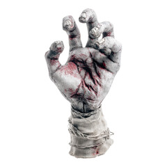 Zombie hand emerging from grave halloween decor studio setting spooky atmosphere close-up horror theme