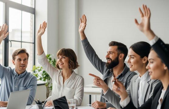Business team raising hands during meeting to ask questions, share ideas or volunteer in modern office setting with engaged employees and corporate feedback
