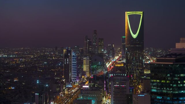 Breathtaking timelapse from the top of Faisaliah Tower, the sunset view of the skyline of Riyadh, Saudi Arabia, dominated by the iconic Kingdom Centre