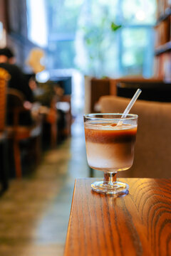 Iced Latte Moment in a Cozy Book Cafe