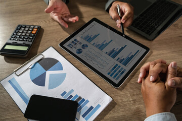Economics economy Business idea Business meeting discussing data analysis with charts and graphs...