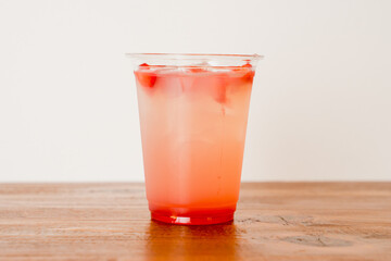 Strawberry lemonade in a clear cup