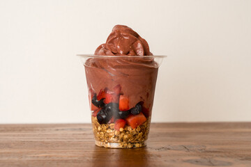 Frozen yogurt with fresh fruit and granola