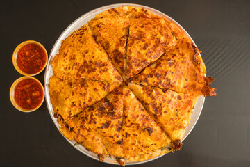 Birria pizza with broth