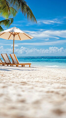 Idyllic tropical beach with lounge chairs under umbrella, palm trees and turquoise sea, perfect for vacation, travel