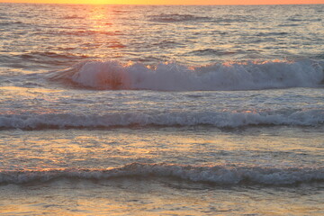 Sunset on the sea. Sunset over the sea. Sea waves.